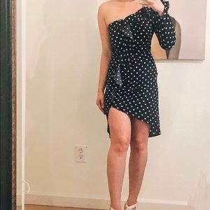Asymmetrical polka dot dress.